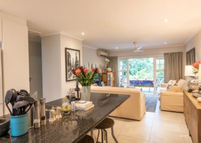 Kitchen & lounge - 2 bed apartment umhlanga - your property specialist chantelle